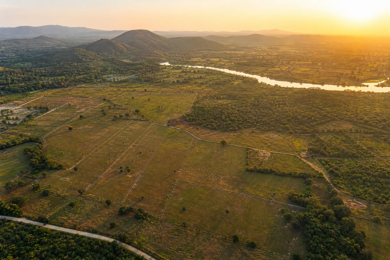 Aerial view of land being assessed for real estate development